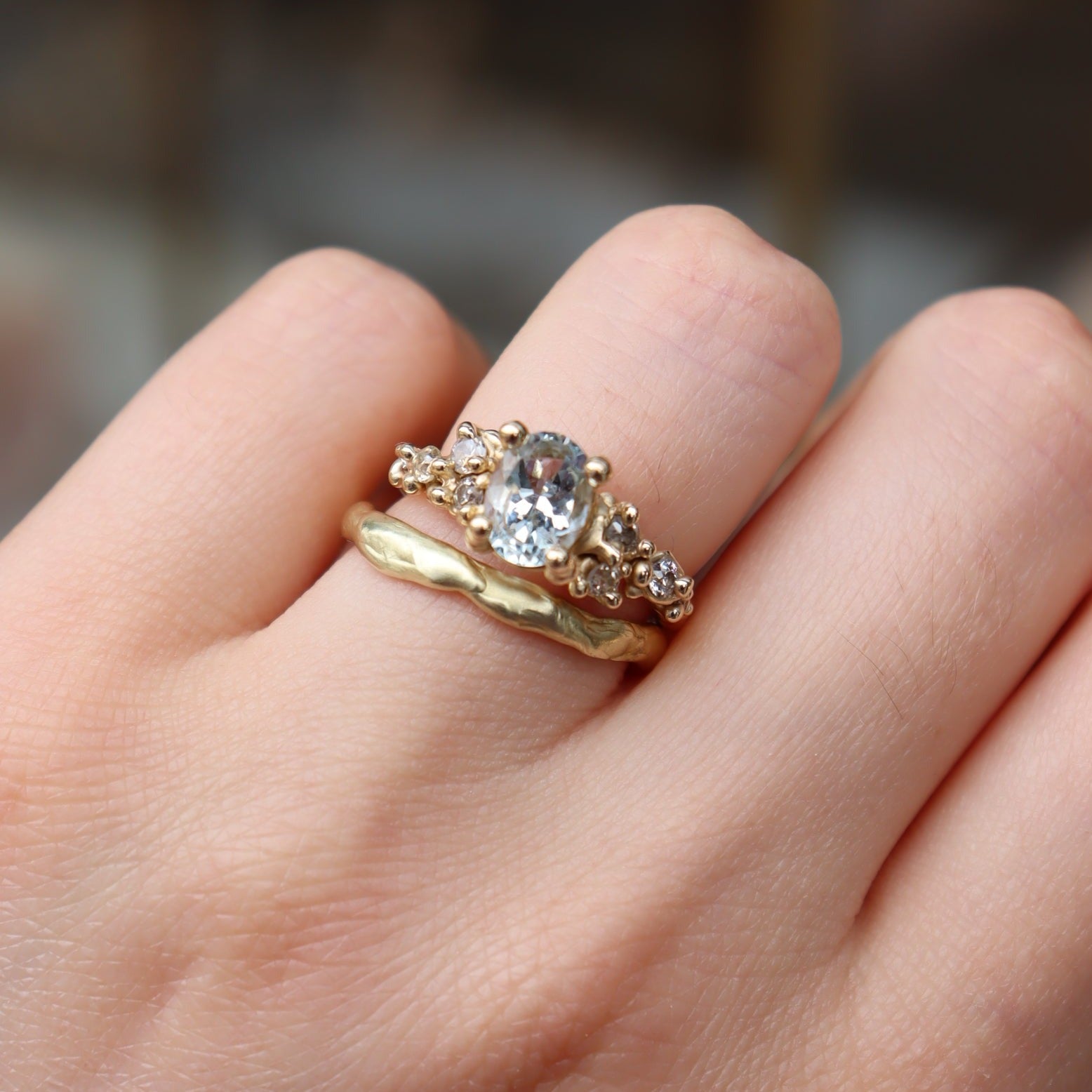 This delicate Molten wedding band is full of organic texture that wraps around the finger seamlessly. This ring is perfect for pairing with a number of engagement rings or looks beautiful worn solo.