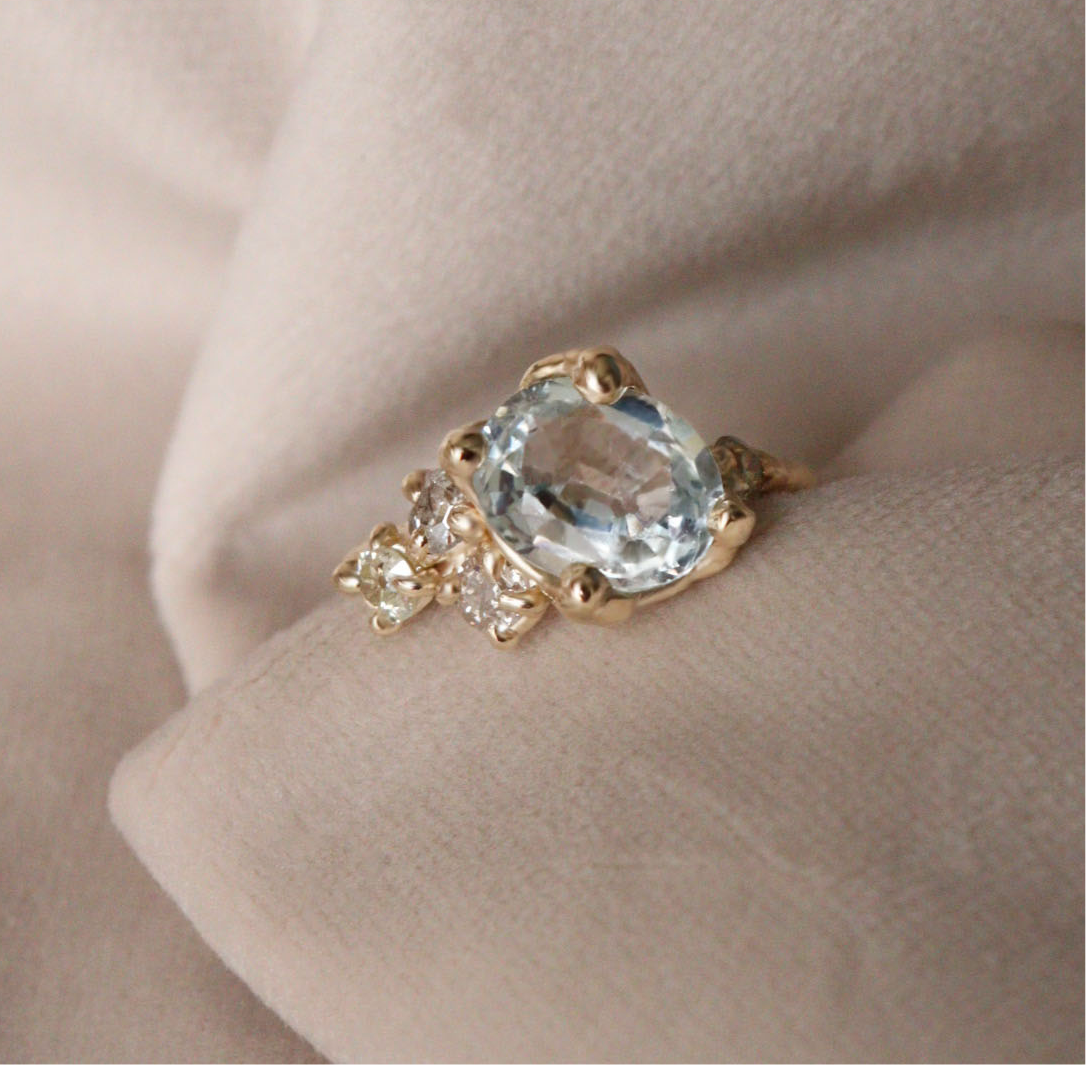 Aquamarine and antique diamond engagement ring