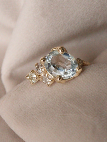 Aquamarine and antique diamond engagement ring