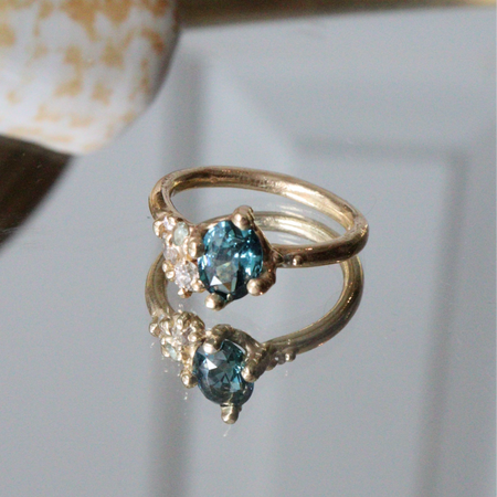 Teal Blue sapphire and diamond engagement ring