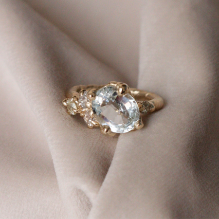 Aquamarine and antique diamond engagement ring