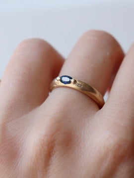 Deep Blue Sapphire on a Molten Gold Band