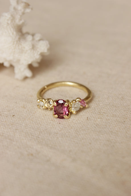 Pink Garnet and diamond cluster engagement ring