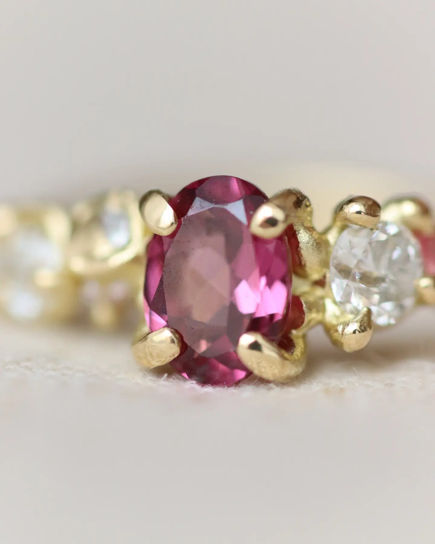 Pink Garnet and diamond cluster engagement ring