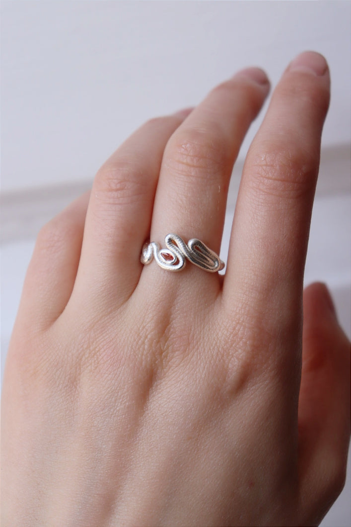 Twisted silver ring with Pink Sapphire