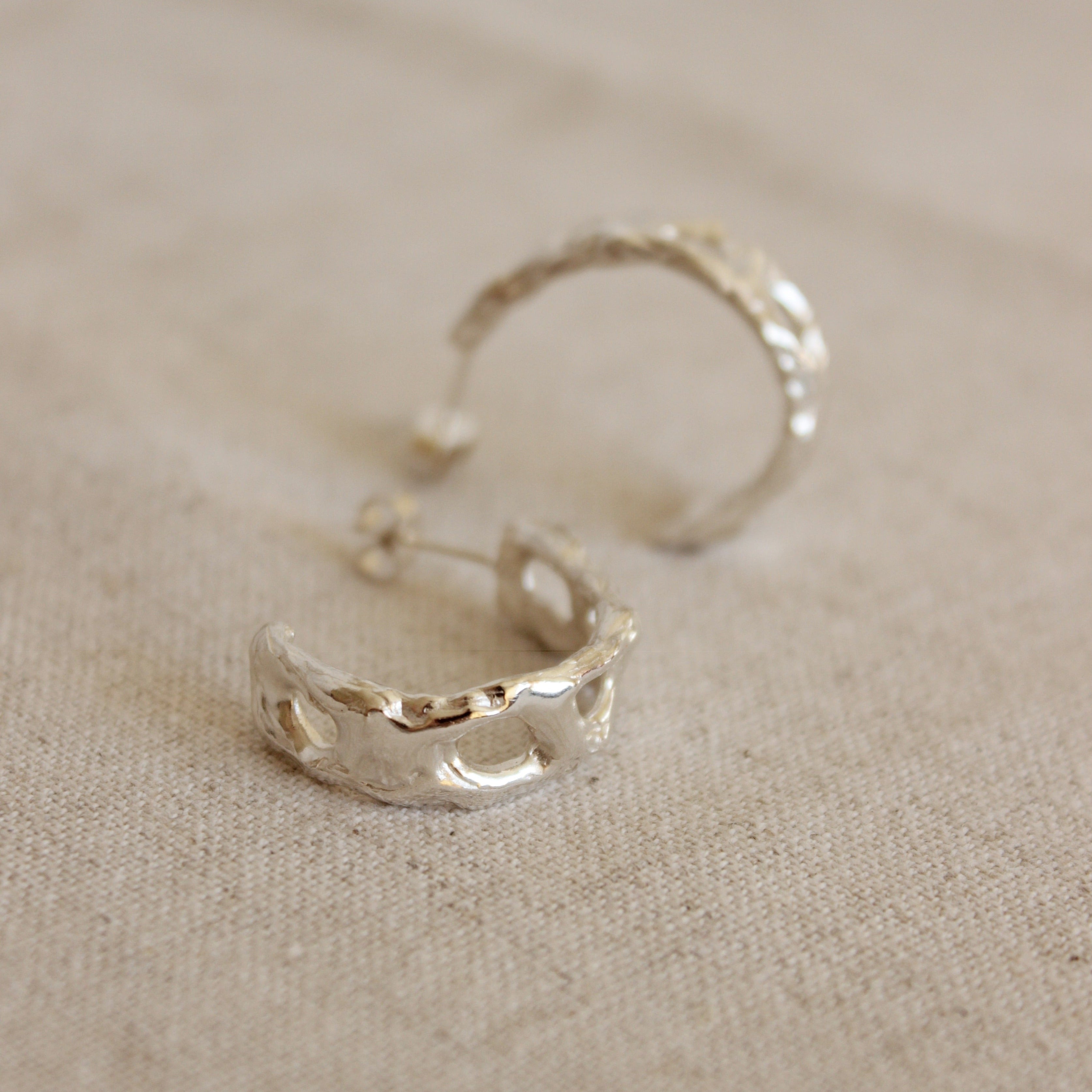 The timeless Cara hoop earrings are lightweight and perfect for everyday wear. Enjoy how these beautiful treasures lift your spirits and outfit effortlessly. The design is a representation of making room for yourself and allowing time to reflect and be present.