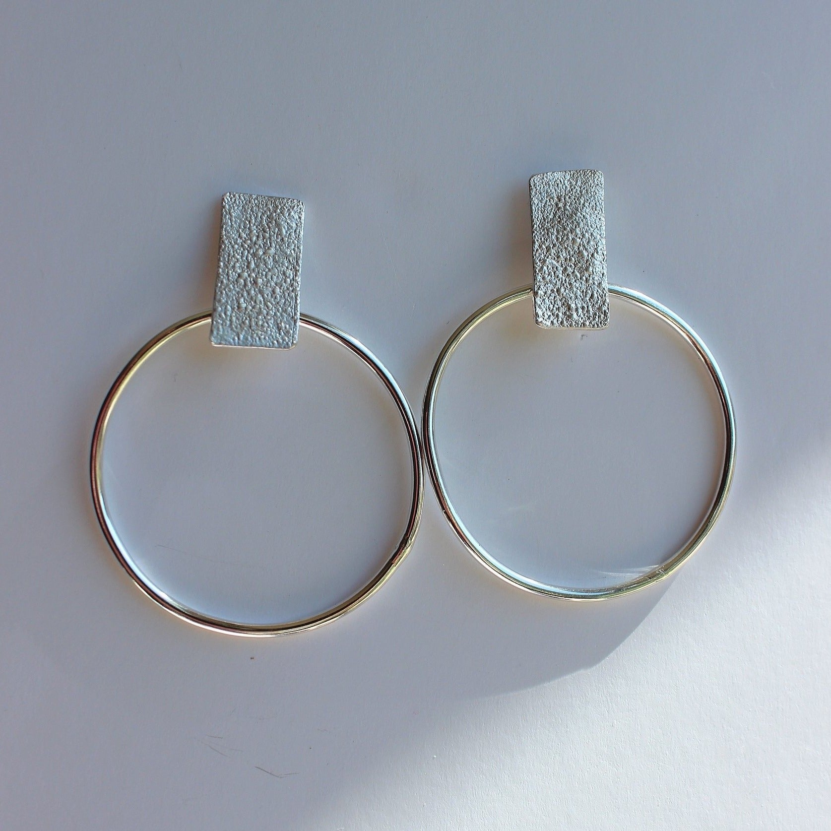 The gorgeous Maisie hoops are full of organic texture and lots of movement. The style is designed to be lightweight and minimal, making them perfect for everyday wear.