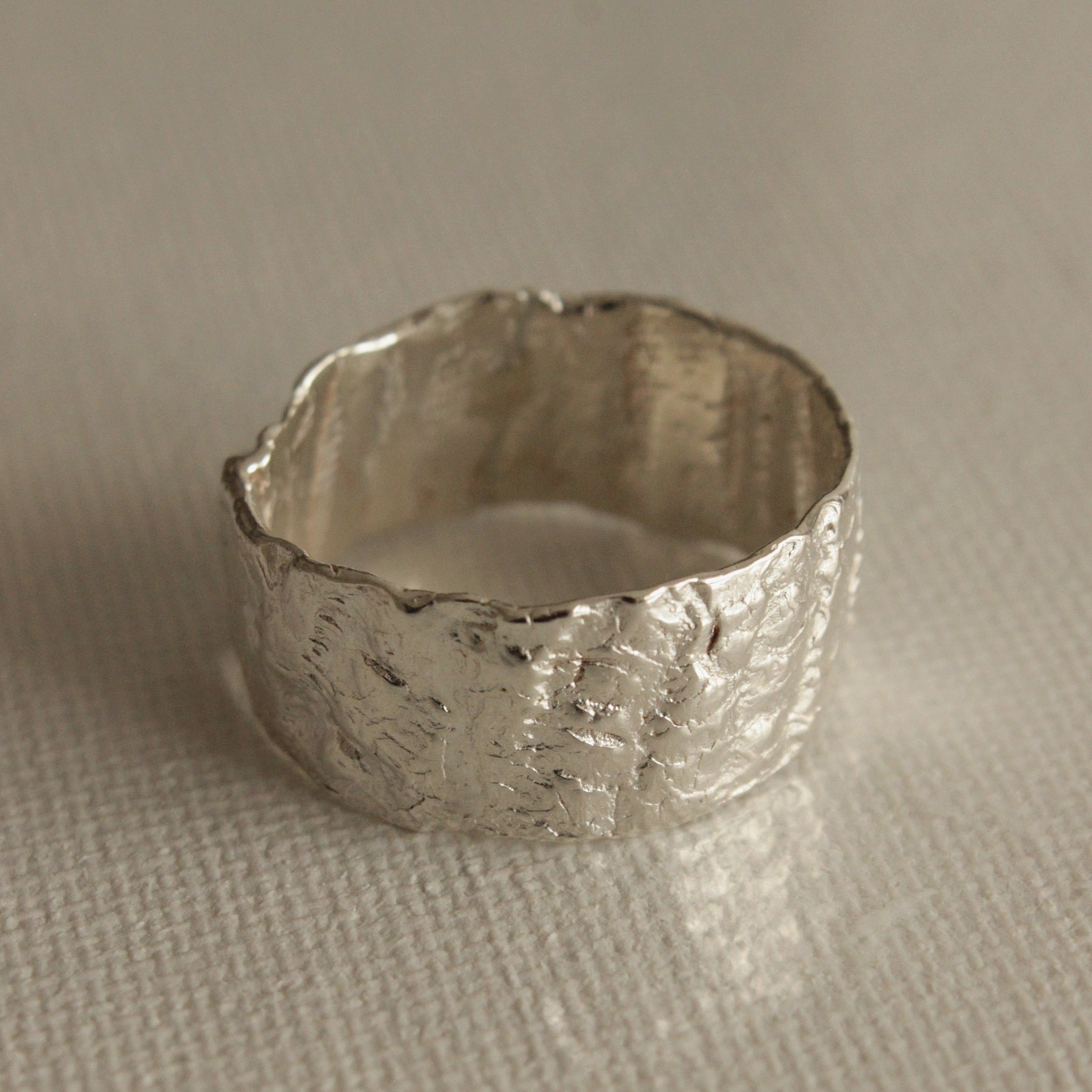 The textured ring features a stunning shell imprint, hidden scale details and elements of the human touch. This special ring is delicate, yet a statement, making it the perfect addition to your collection. Enjoy this piece everyday and let its oceanic texture transport you to the deepest depths of the ocean. 