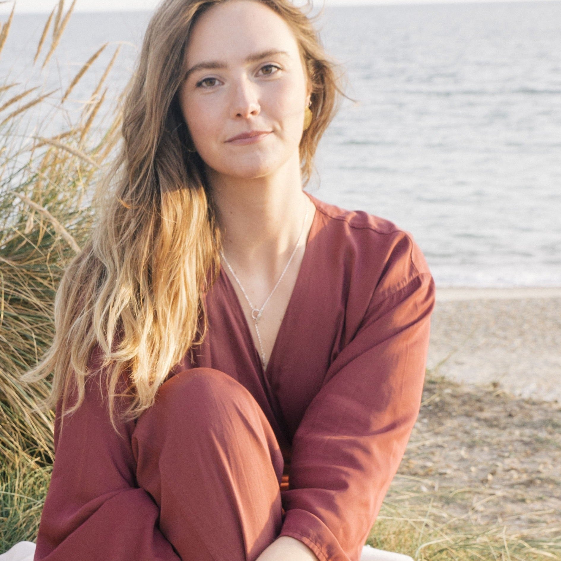 The Pendant is connected at the front through a textured loop and features two delicate Siren Imprinted pendants. Enjoy how this light weight treasure feels against your skin, and the tactile movement that encourages busy hands to be still.
