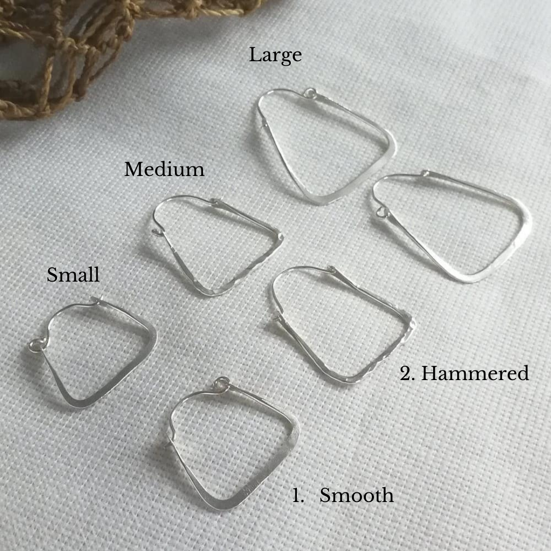 The Rectangle hoops are one of the first ever Josie Mitchell jewellery creations and are widely known for their comfort and movement. Customise your earrings to suit your personal taste with a selection of three different sizes and textures. Each one is mindfully hand crafted by Josie Mitchell Jewellery in her Bournemouth studio using sustainable recycled sterling silver.